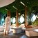 Guests relaxing in a spa setting decorated to look like a rainforest