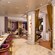 The interior of the Untangled Salon reveals manicure stations, private treatment stations and displays filled with high end beauty products