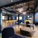 The Hideaway youth club on the Disney Treasure with TVs, sofas, large poufs and a bar with bar seats