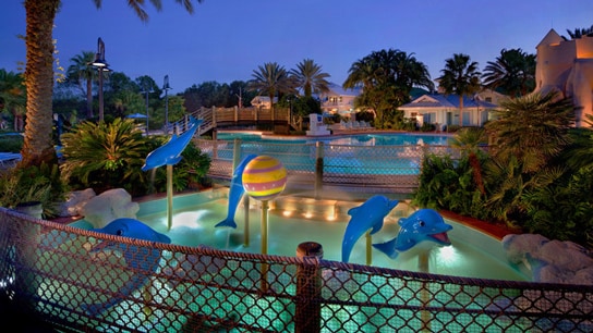Sandcastle Pool featuring a children’s splash area decorated with dolphins