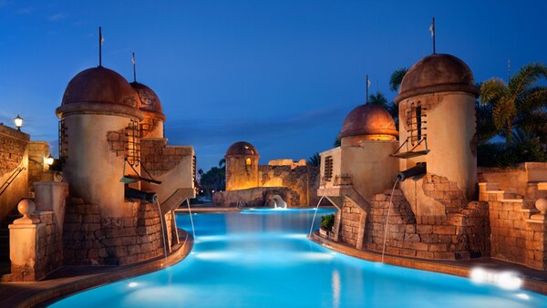 A fortress-themed pool with water cannons at Disney's Caribbean Beach Resort in Florida