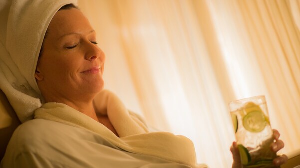 A woman in a robe at Senses � A Disney Spa at Disney's Grand Floridian Resort & Spa