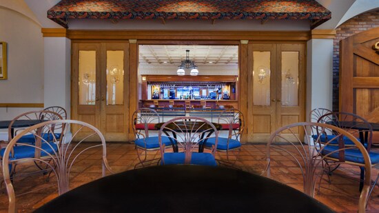 Tables and chairs at the themed food court at Disney’s Port Orleans Resort French Quarter