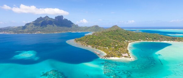 Lush green islands surrounded by open water