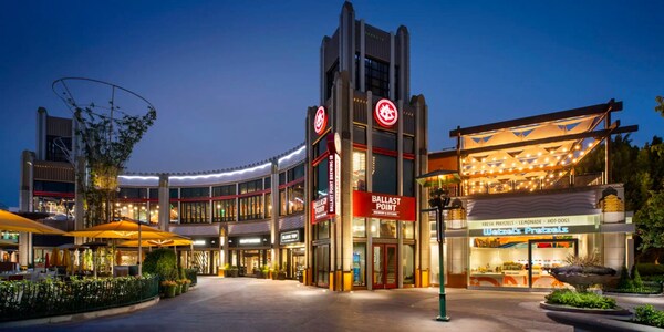 The entrance to the Downtown Disney District at night