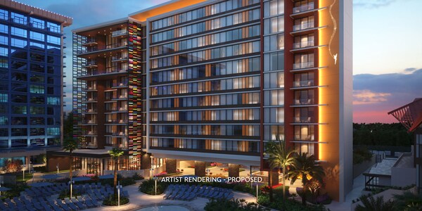 Artist rendering of the exterior of The Villas at Disneyland Hotel, at dusk