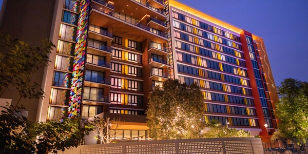 The Villas at Disneyland Hotel building illuminated during the nighttime 