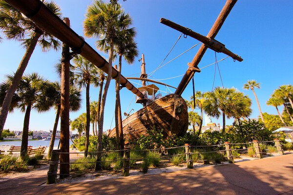 View of the 'shipwreck' at Stormalong Bay under a clear blue sky