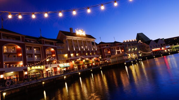 The pool at Bay Lake Tower lit up after dark