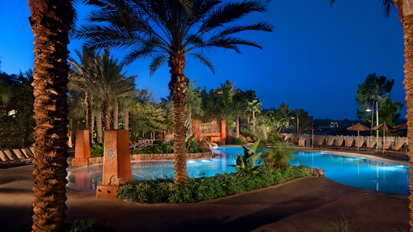 Surrounded by palm trees, the Samawati Springs Pool at night