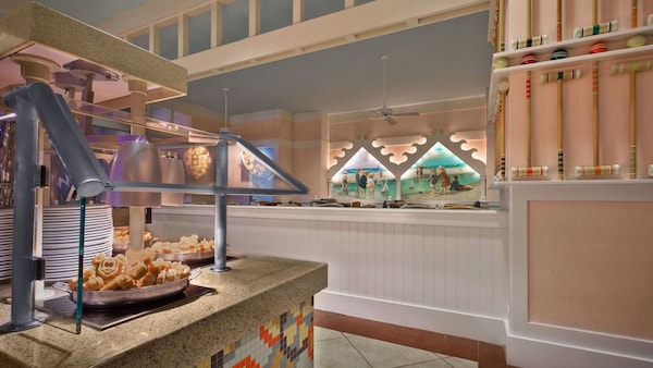 Two plates of Mickey Waffles on a buffet bar