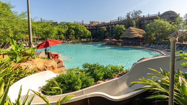 A waterslide next to the Uzima Springs pool at Disney's Animal Kingdom Lodge in Walt Disney World Resort