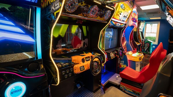 Six arcade games in the Side Show Games Arcade at Disney's BoardWalk Inn