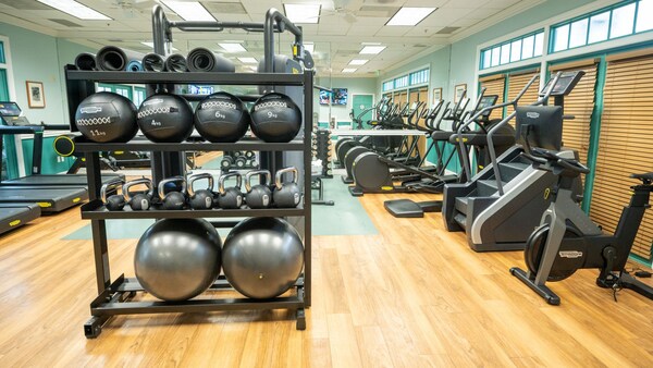 The Old Key West Exercise Room, with treadmills, elliptical machines, a stair climber and free weights