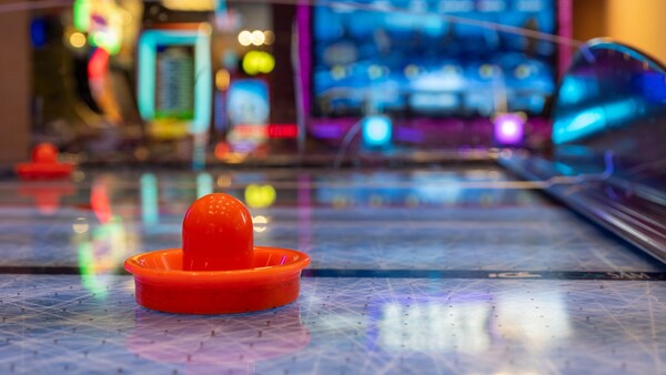 An air hockey table in Buttons and Bells Arcade at Disney’s Wilderness Lodge