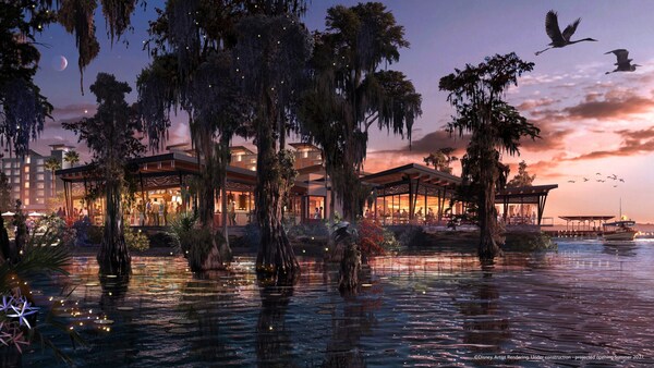 Disney Lakeshore Lodge al atardecer con palmeras y garzas sobrevolando