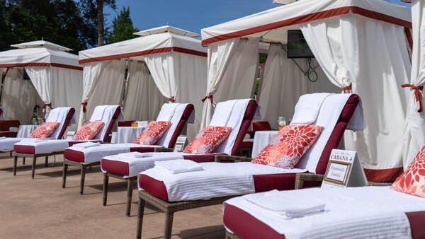 Private poolside rental cabanas and lounge chairs at Disney’s Grand Floridian Resort & Spa