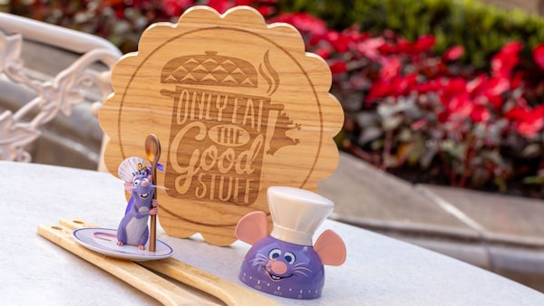 A wooden spoon and fork, an ornament, a kitchen timer and a trivet, all 'Ratatouille' themed