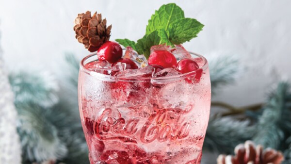 A Frosted Cranberry Mint holiday mocktail from the Coca Cola Store	