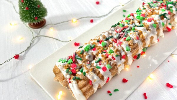 A plate with 2 Gingerbread Churros from Sunshine Churros	