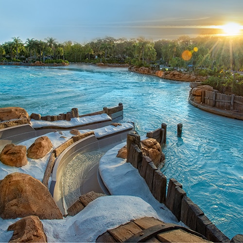 The twin waterslides of Bay Slides empty into a tranquil section next to the Surf Pool