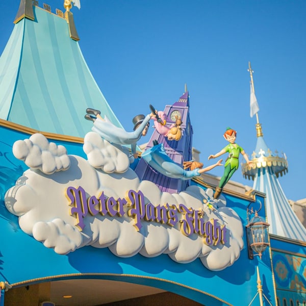 A sign for Peter Pan’s Flight in Magic Kingdom park