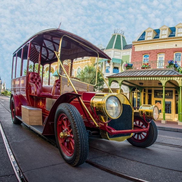 A jitney driving down Main Street, USA	