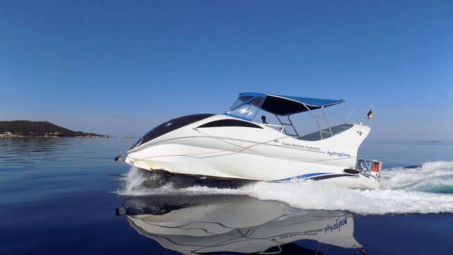 A speed boat featuring the words Glass Bottom Hydroplane