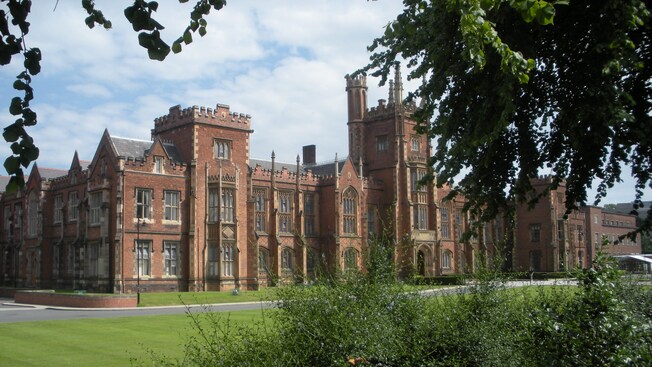 The brick Gothic Tudor façade of the Lanyon Building at Queen's University in Belfast, North Ireland