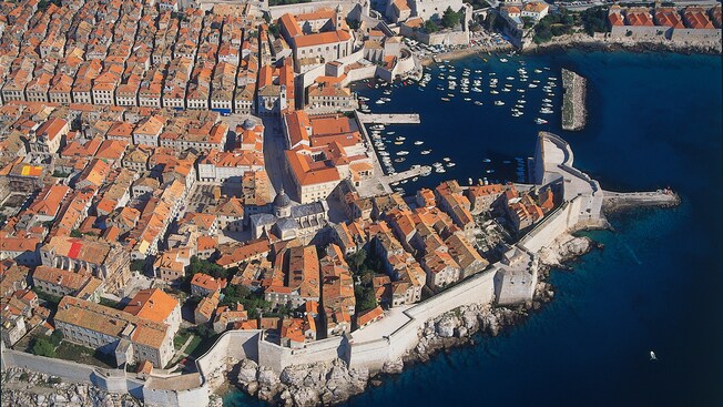 The coastal defensive walls and tiled rooftops of Dubrovnik