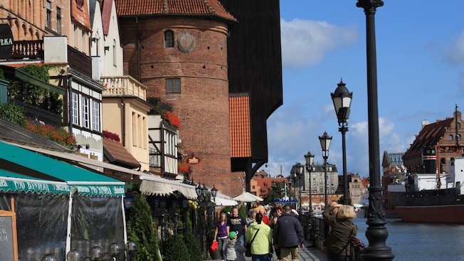 A historical street lined with gabled architecture A historical street lined with gabled architecture