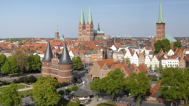 The Lubeck cityscape featuring medieval buildings with towers and spires