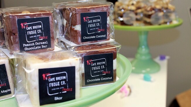 Various confections with the Cape Breton Fudge Company logo on display