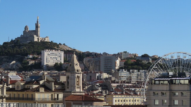 The Romanesque Marseille Cathedral perched on a hill overlooking the port of Marseille
