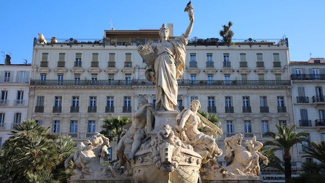 A monumental fountain in a city square A monumental fountain in a city square