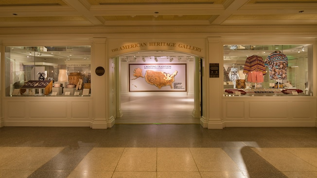 The entrance to The American Heritage Gallery, flanked by displays with Native American artifacts