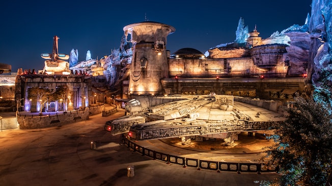 A life size replica of the Millennium Falcon in front of Ohnaka Transport Solutions in the heart of Black Spire Outpost 