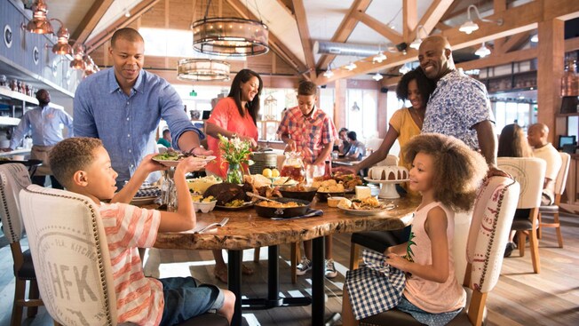 A family dining inside Chef Art Smith's Homecomin' restaurant