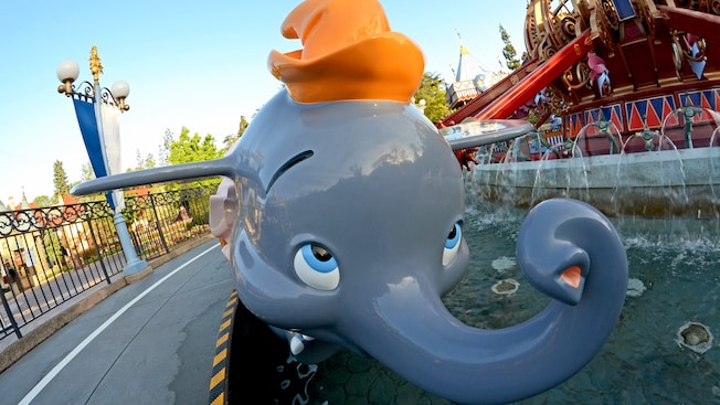 The front of one of the Dumbo the Flying Elephant cars features the character's innocent eyes