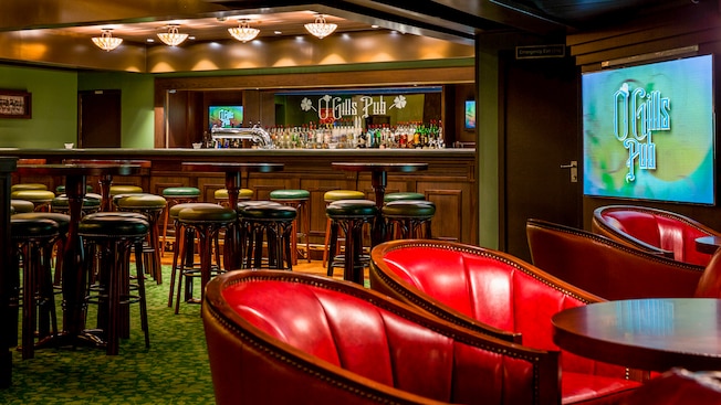 An Irish Pub called O Gills has lots of bar tables with stools and chairs with cocktail tables An Irish Pub called O Gills has lots of bar tables with stools and chairs with cocktail tables