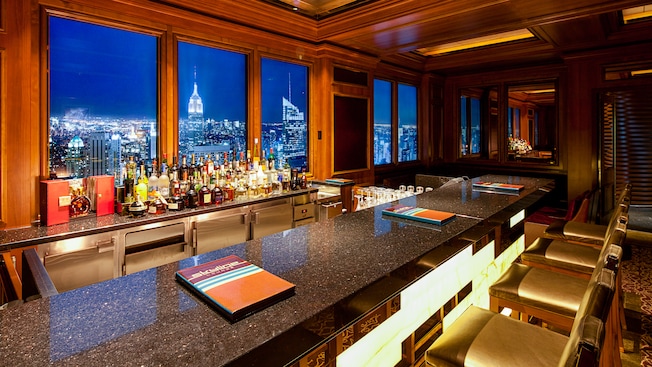 The panels behind a granite bar show a mural designed to create a convincing cityscape view The panels behind a granite bar show a mural designed to create a convincing cityscape view