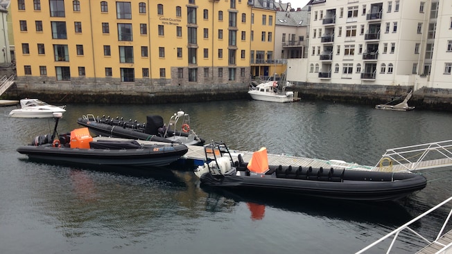 3 rigid inflatable boats docked in a canal 3 rigid inflatable boats docked in a canal