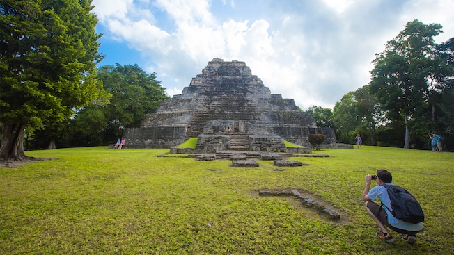 Tourists take pictures of a Mayan temple Tourists take pictures of a Mayan temple