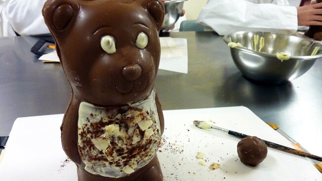 Close-up of a chocolate bear with white chocolate features
