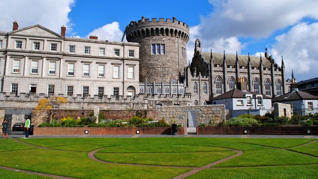 Dublin Castle has a medieval tower with a Gothic Revival chapel and 18th century state apartments