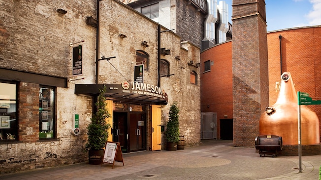 The weathered brick façade of the Old Jameson Distillery’s main entrance The weathered brick façade of the Old Jameson Distillery’s main entrance