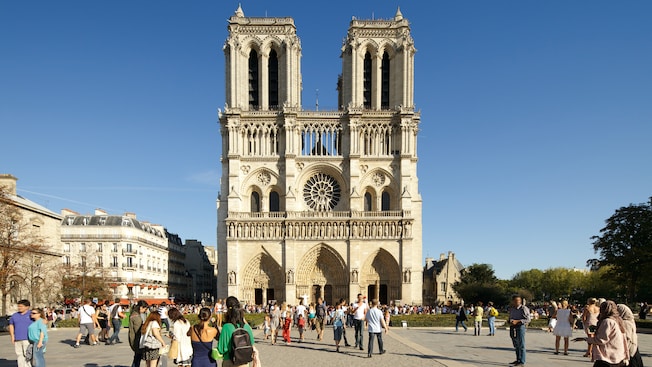 People outside the exterior of Notre Dame People outside the exterior of Notre Dame