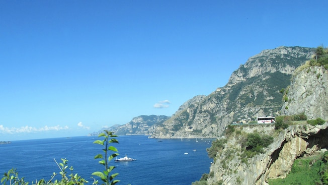 A coastal highway on a cliff overlooks the Amalfi Coast