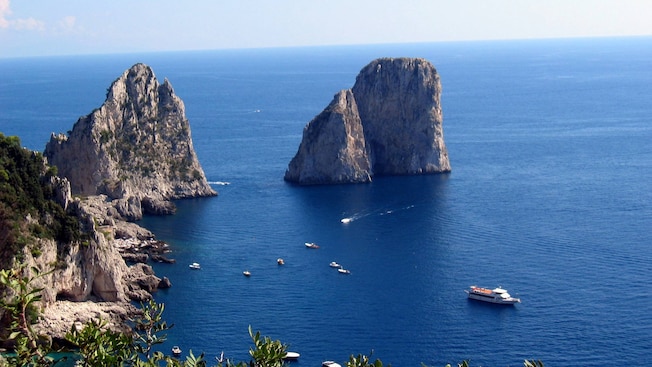 Rock formations jutting out from the waters off the coast of Capri Rock formations jutting out from the waters off the coast of Capri