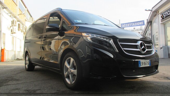 The front end of a shiny new Mercedes van with tinted windows
